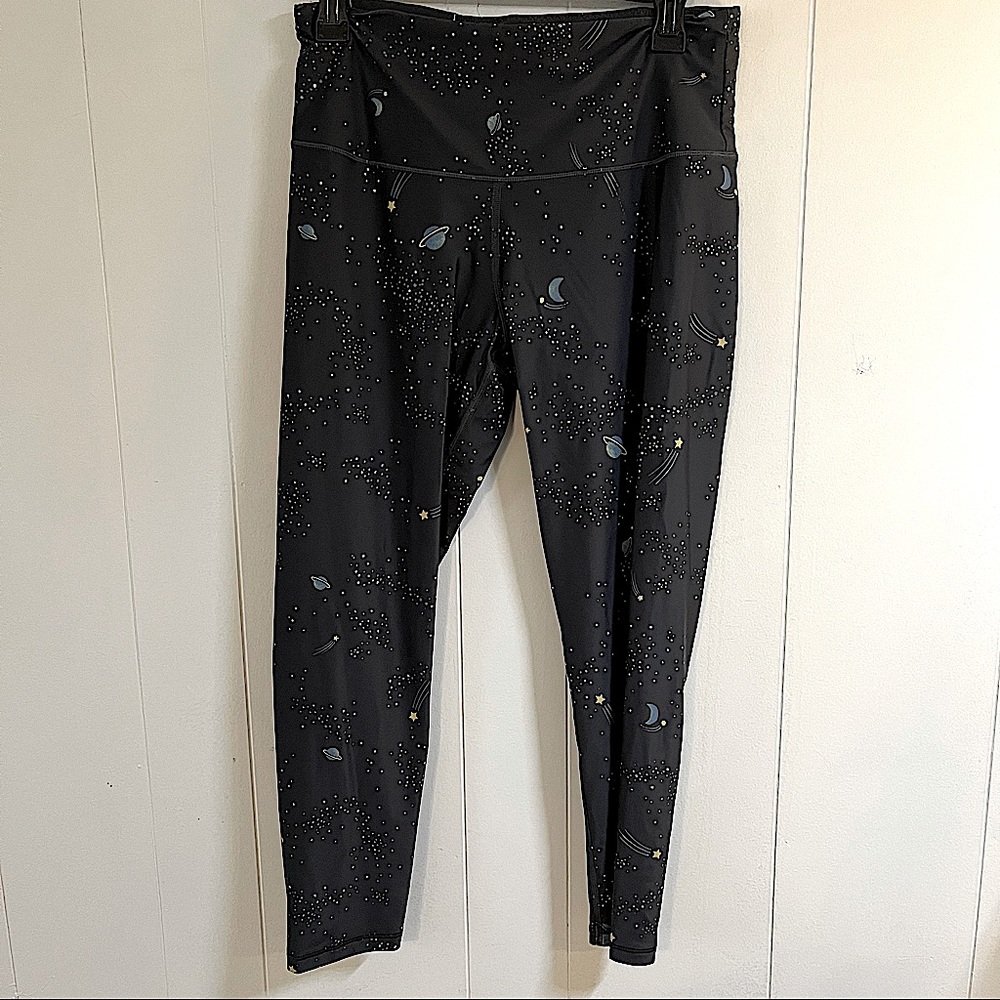 Dark gray space stars planets moon Victoria Sport leggings